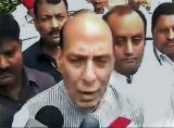 Oppn targets govt over reports about Rajnath’s son