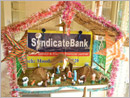 M’belle: Christmas  celebrated in Syndicate Bank with customers