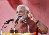 Modi slams Congress for sidelining Pranab for PM