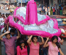 Mangalore: Social Activists Stage Protest Rally with Mega Footwear against Women Atrocities