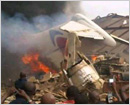 Plane with 153 people crashes into building in Nigeria