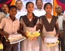 Udupi/M’Belle: Sponsors donate books and uniforms to 57 students of St. Lawrence Kannada Mediu