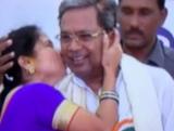 Woman kisses Karnataka Chief Minister in public