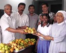 Mangalore: Fruits distributed to poor children on Indira Gandhi’s birth anniversary