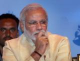 Under attack, Modi orders inquiry into snooping row